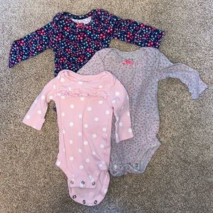 Bundle of (3) long sleeve NB Carters baby girls onesie